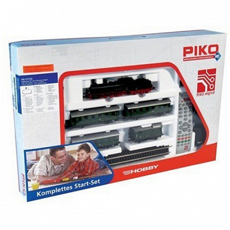 На картинке изображен Игровой набор Piko Паровоз и 3 пассажирских вагона 57125 Игровой набор Piko Паровоз и 3 пассажирских вагона 57125
