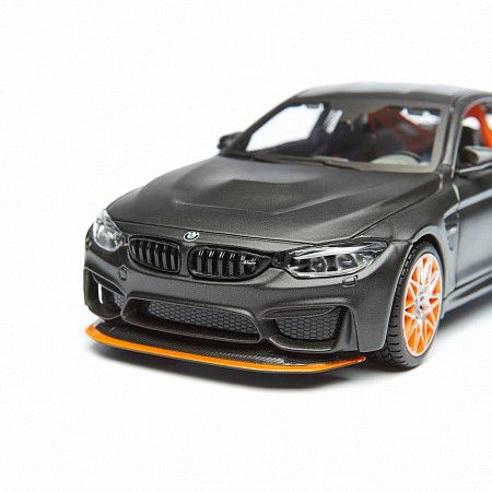 На картинке изображен Масштабная модель автомобиля Maisto 1:24 БМВ M4 GTS (31246) grey Масштабная модель автомобиля Maisto 1:24 БМВ M4 GTS (31246) grey