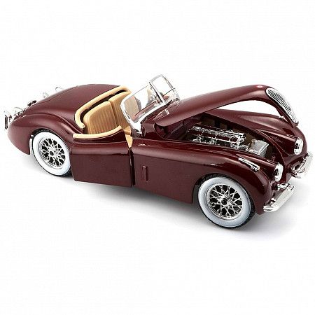 На картинке изображен Машинка Bburago 1:24 Jaguar Xk 120 Roadster 1951 (18-22018) red Машинка Bburago 1:24 Jaguar Xk 120 Roadster 1951 (18-22018) red